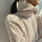 BOUCLÉ COUTURE Rollkragenpullover